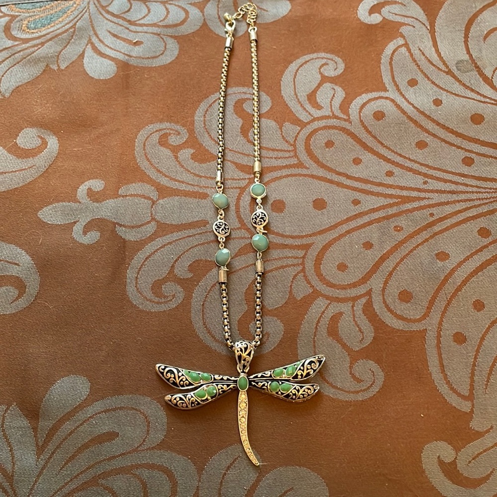 Dragonfly embellished silver and green stone necklace.